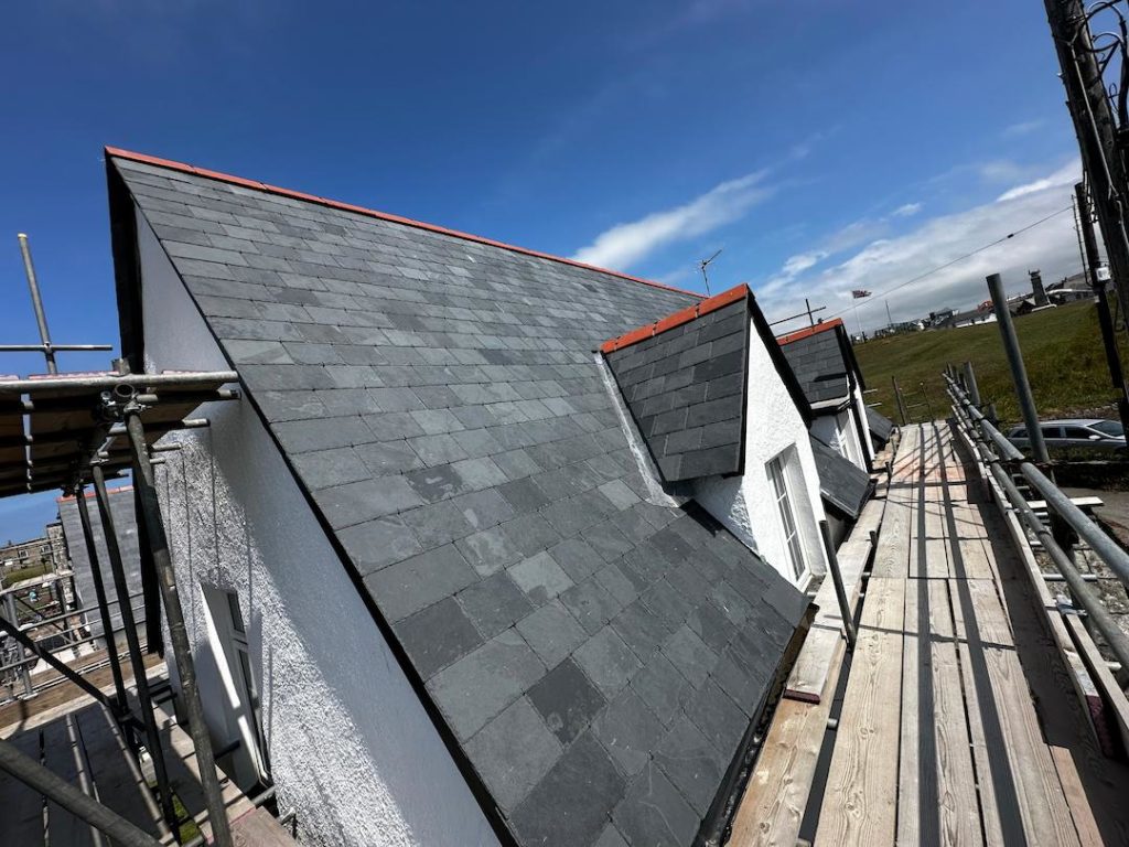New Slate Tiles Installed On Pitched Roof